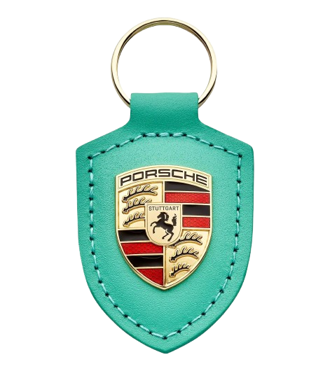 Original Porsche Schlüsselanhänger Wappen „Driven by Dreams“ – 75Y Mint grün